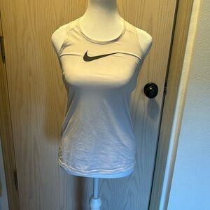 White Nike athletic top.